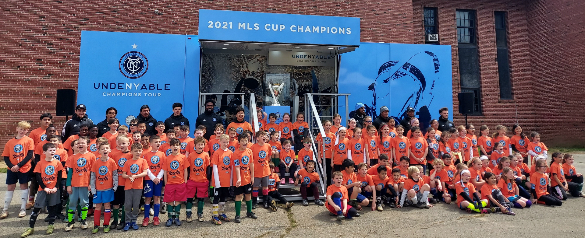 image of the NYCFC presenting the cup at FPBS School
